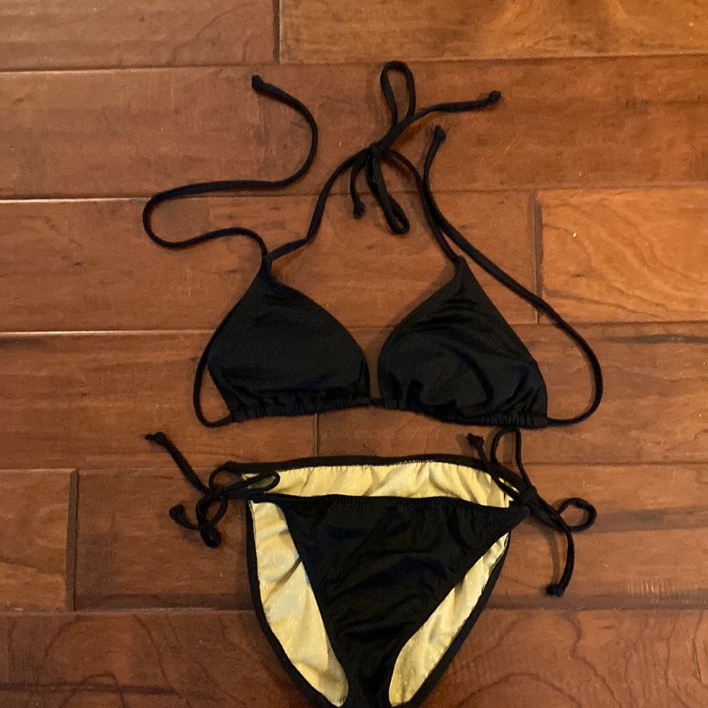 Athleta brand black bikini in brand new condition.